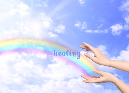 Woman and rainbow as source of healing energy on sunny day, closeupの写真素材