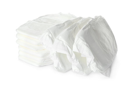 Pile of baby diapers isolated on whiteの写真素材