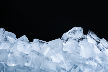 Ice cubes on black background, closeup viewの素材 [FY310196931040]