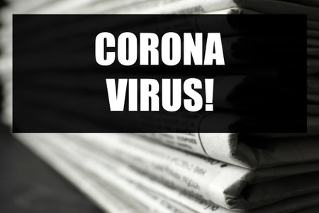 Word CORONAVIRUS and stack of newspapers, closeup. Journalist's workの写真素材