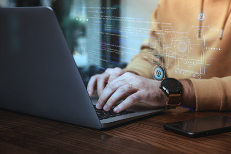 Hacker working with laptop at table, closeup. Cyber attack