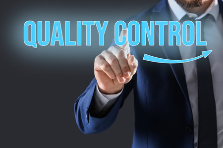 quality control service. Businessman using virtual screen, closeupの写真素材