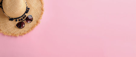 Stylish hat and sunglasses on color background, top view with space for text. banner design
