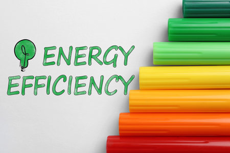 energy efficiency concept. Colorful markers on white background, flat layの写真素材