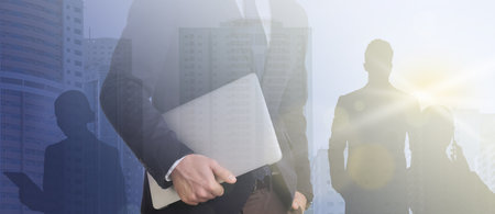 Multiple exposure of business people and cityscape. banner designの写真素材
