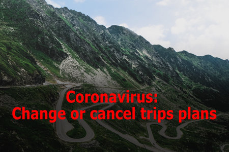 Trips cancellation during coronavirus quarantine. Landscape with mountains and winding roadの写真素材