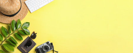 Flat lay composition with vacation accessories on yellow background, space for text. Banner designの写真素材