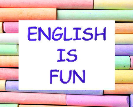 Many pieces of color chalk as background, top view. English is funの写真素材