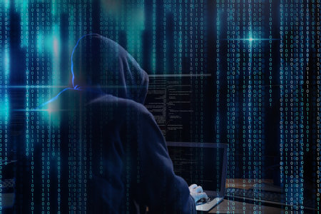 Cyber criminal hacking system at table, digital binary code on foregroundの写真素材