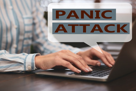 Woman working with laptop, closeup. Use information to avoid panic attacks