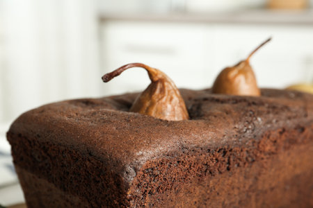 Tasty chocolate pear bread against blurred background, closeup. homemade cakeの写真素材