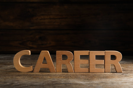Word CAREER made with wooden letters on table. Space for textの写真素材