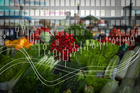 Fresh ripe vegetables and herbs on counter at wholesale market