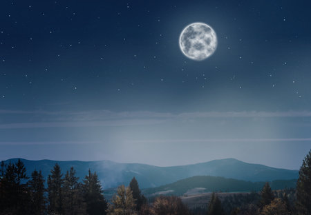 Beautiful landscape with full moon in the night skyの写真素材