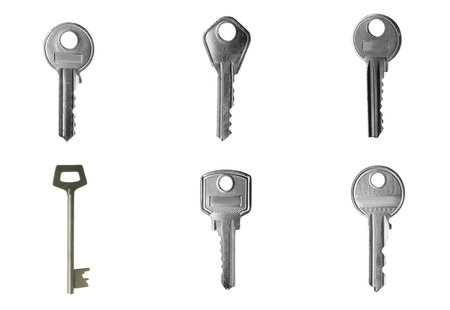 Set of modern steel keys on white backgroundの写真素材