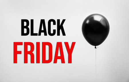 Text BLACK FRIDAY and big balloon on light backgroundの写真素材