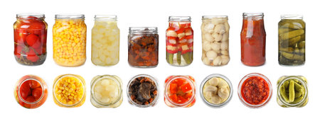Set of jars with pickled vegetables and mushrooms on white background. banner designの写真素材