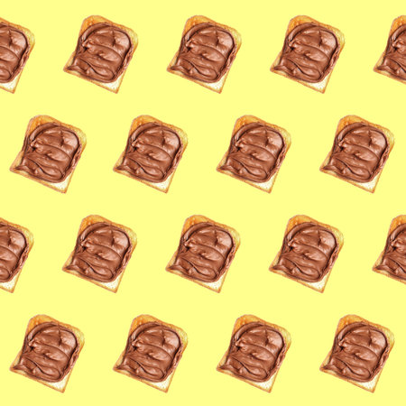 Set of delicious toasted bread with chocolate spread on yellow background, top viewの写真素材