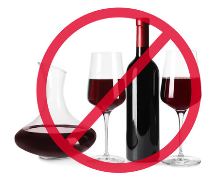 Set of different alcohol drinks and STOP sign on white backgroundの写真素材