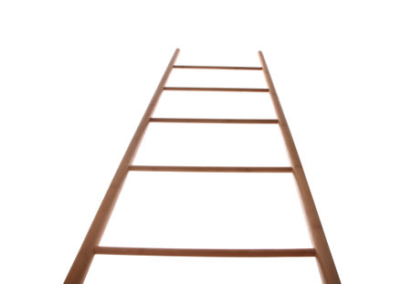 Modern wooden ladder isolated on white, low angle viewの写真素材