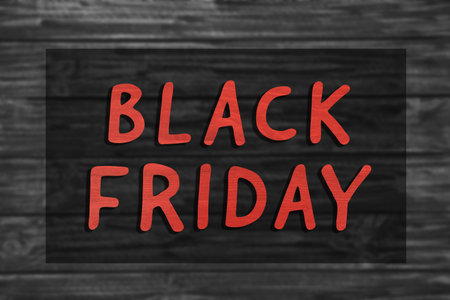 Phrase Black Friday and blurred view of wooden surface on backgroundの写真素材