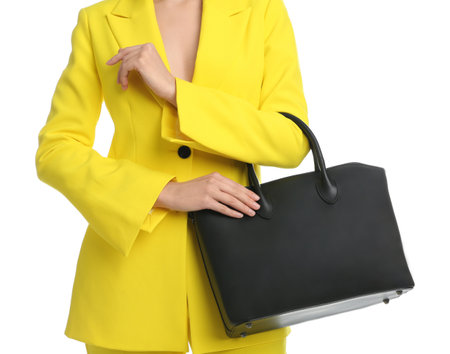 Young woman with stylish bag on white background, closeupの写真素材
