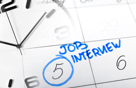 Collage of clock and calendar with text JOB INTERVIEWの写真素材