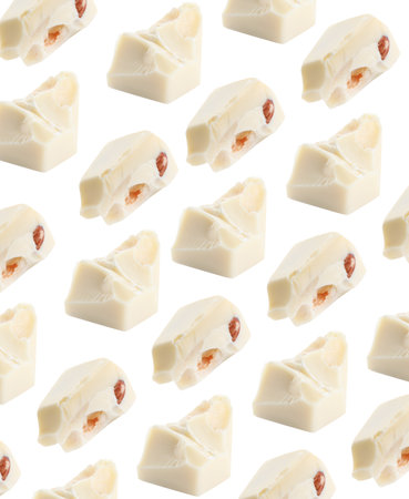 Many chocolate pieces on white background. pattern designの写真素材