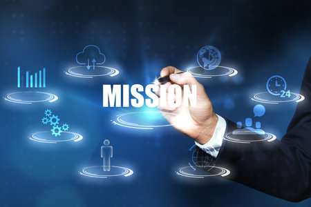 Mission and business concept. Man using virtual screenの写真素材