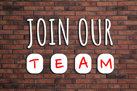 Phrase Join our team on brick wall