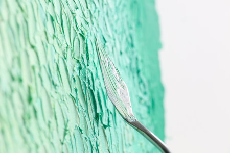 Abstract colorful artwork with spatula, closeup viewの写真素材