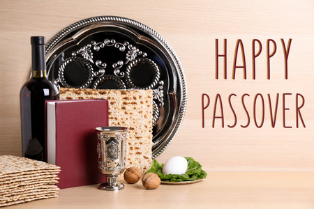 Symbolic Pesach (Passover Seder) items on wooden tableの写真素材