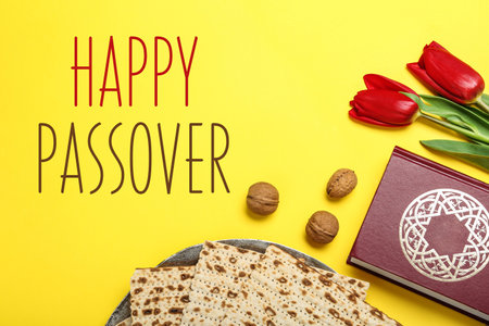 Flat lay composition with matzos on yellow background. Passover (Pesach) celebrationの写真素材