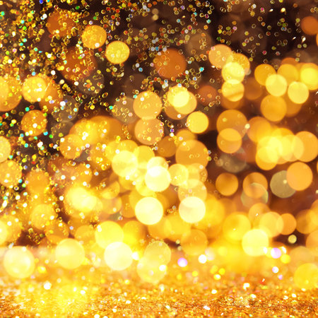 Luxury golden glitters on dark background. bokeh effectの写真素材