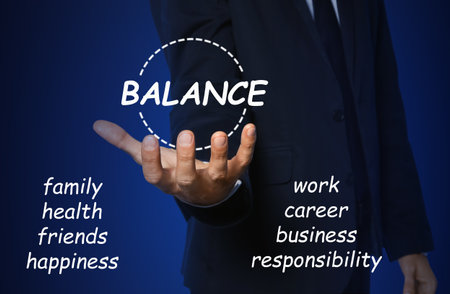 Man against blue background, closeup. Concept of balance between life and workの写真素材