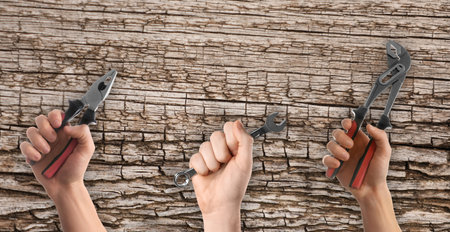 Set with photos of plumbers holding different tools against tree bark, closeupの写真素材