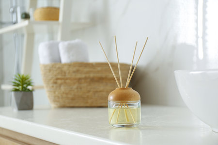 Reed air fresher on counter in bathroom
