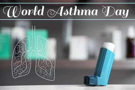world asthma day. Inhaler on table against blurred backgroundの写真素材