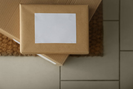 Parcels on rug near doorway. delivery serviceの写真素材