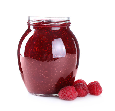 Delicious jam and fresh raspberries isolated on white