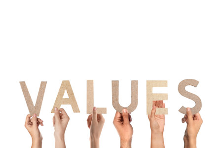 People making word VALUES of letters on white background