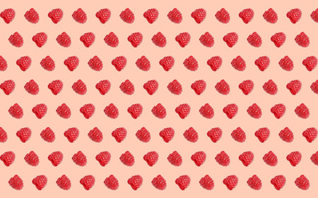 Pattern of raspberries on pale pink background