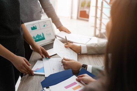 Office employees working with documents at table, closeup. business analytics