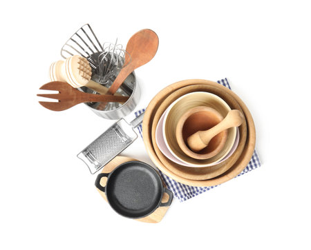 Set of different cooking utensils and dishes on white background, top view