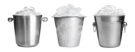 Set of different metal buckets with ice cubes on white backgroundの写真素材