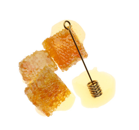 Fresh honeycombs and dipper on white background, top viewの写真素材