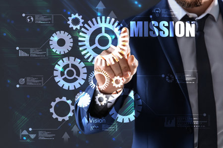 mission concept. Businessman using virtual screen, closeupの写真素材