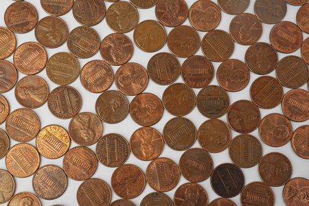 Many coins on white background