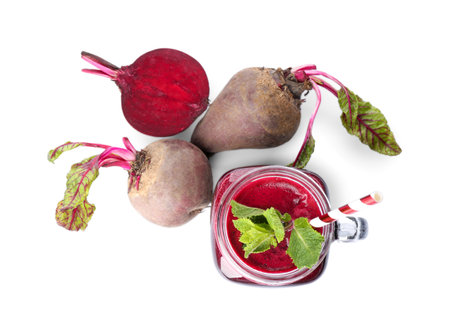 Fresh beets and juice isolated on white, top viewの写真素材