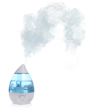 New modern air humidifier with steam isolated on whiteの写真素材